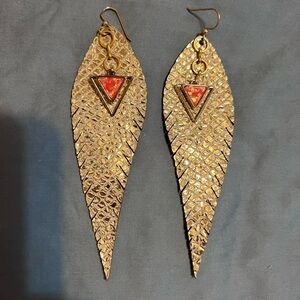 Beautiful gold soft earrings with coral stone